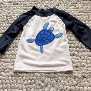 Gymboree Baby navy and white rash guard with turtle appliqué